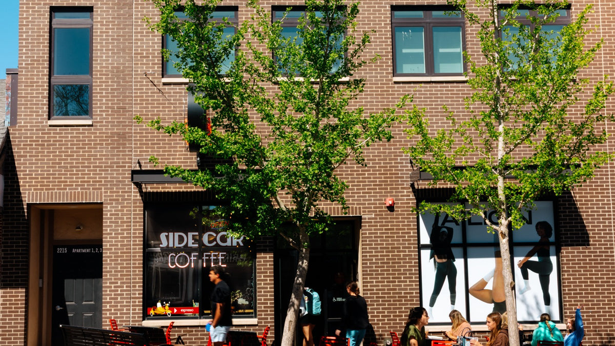 Sidecar Coffee College Hill patio and storefront on a sunny day